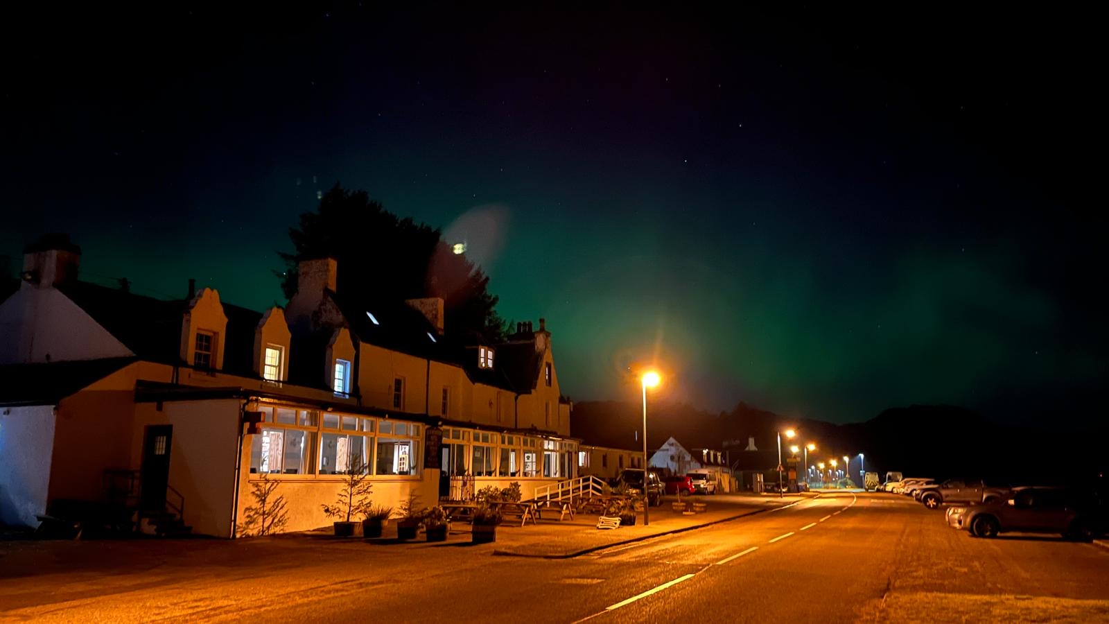 Northern Lights above Lochcarron and reflected across the loch