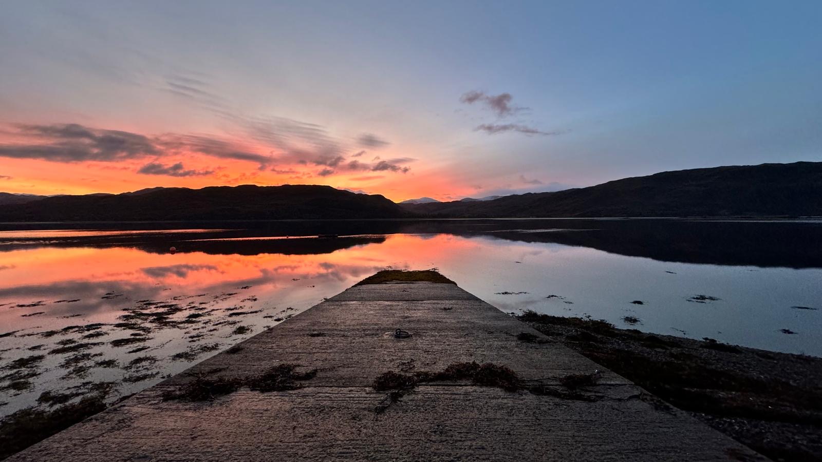 The hotel jetty reaching into Loch Carron at sunset