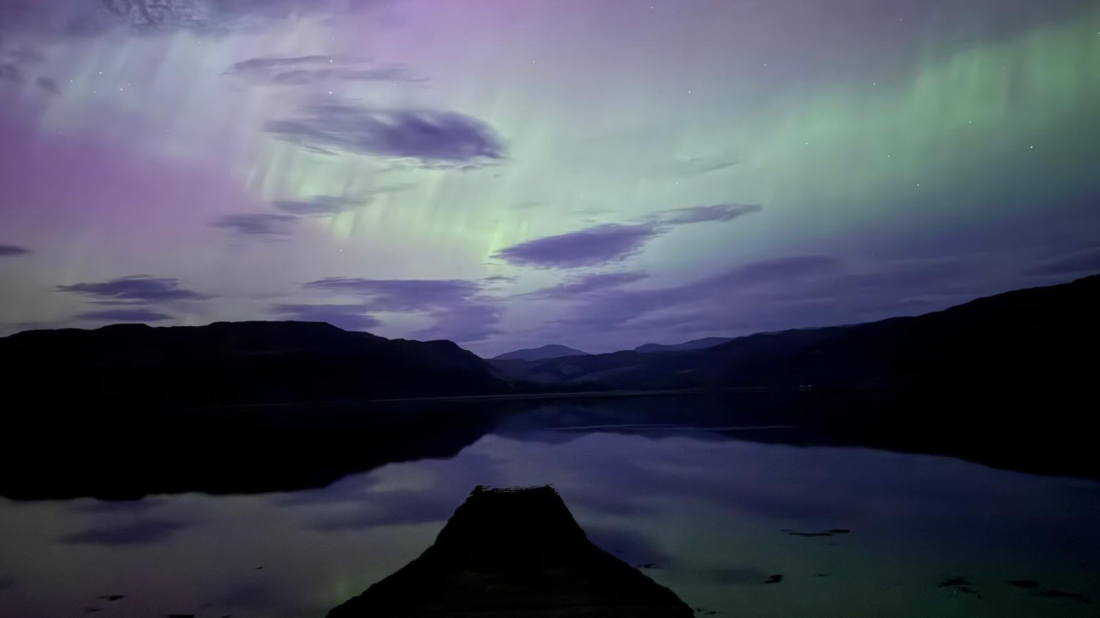 The aurora reflected across Loch Carron